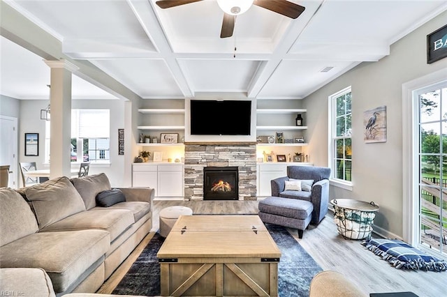 3820 Whites Lndg, Chesapeake, VA 23321 - living room with wood finished floors, coffered ceiling, ceiling fan, a stone fireplace, and beamed ceiling