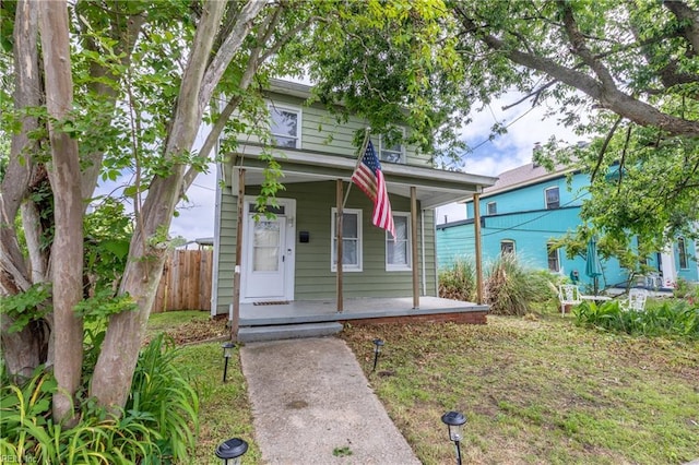 113 E Virginia Ave, Hampton, VA 23663 - view of front of home featuring a porch and fence