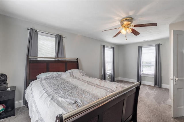 113 E Virginia Ave, Hampton, VA 23663 - carpeted bedroom featuring baseboards and a ceiling fan