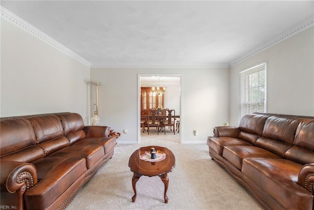 living room featuring a chandelier, ornamental molding, carpet, and baseboards