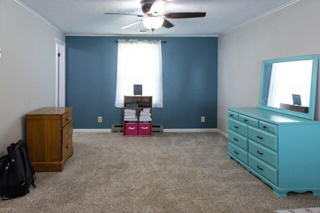 125 Messick Rd, Poquoson, VA 23662 - bedroom with crown molding, a textured ceiling, a baseboard radiator, light colored carpet, and baseboards
