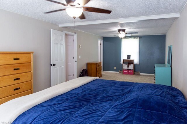 125 Messick Rd, Poquoson, VA 23662 - bedroom with a textured ceiling, carpet flooring, a ceiling fan, baseboards, and crown molding