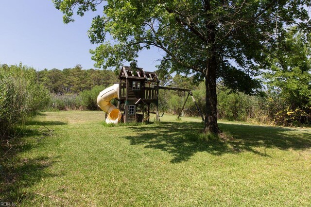 125 Messick Rd, Poquoson, VA 23662 - view of green lawn featuring a playground
