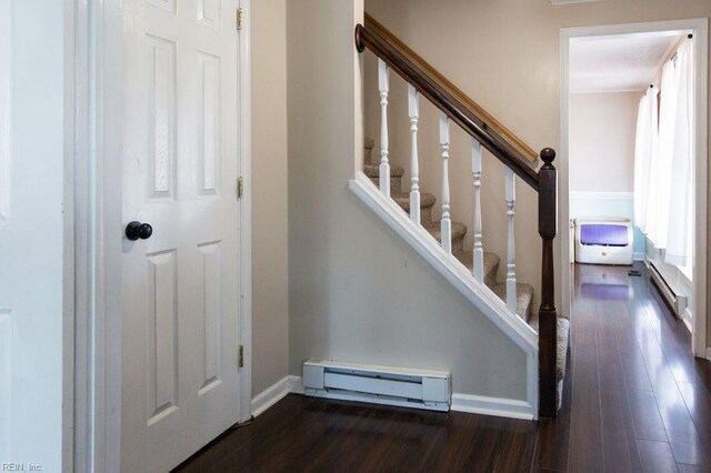 125 Messick Rd, Poquoson, VA 23662 - staircase featuring a baseboard heating unit, wood finished floors, and baseboards