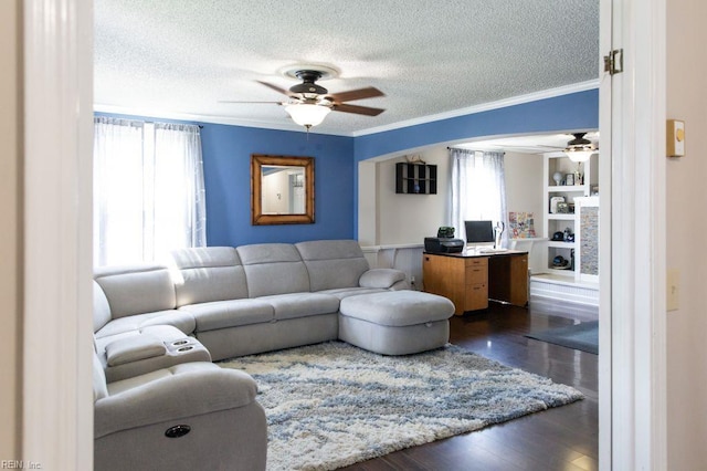 125 Messick Rd, Poquoson, VA 23662 - living area with a ceiling fan, a textured ceiling, ornamental molding, healthy amount of natural light, and dark wood-style floors