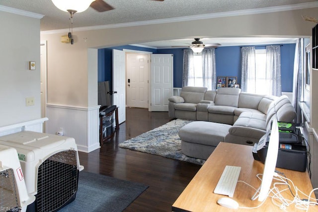 125 Messick Rd, Poquoson, VA 23662 - living area featuring a ceiling fan, wood finished floors, wainscoting, ornamental molding, and a textured ceiling