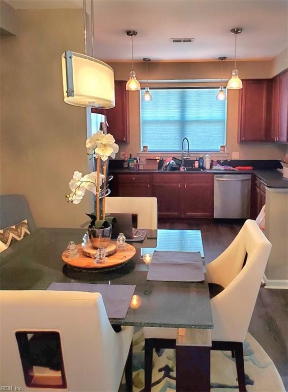dining room featuring dark wood-style floors