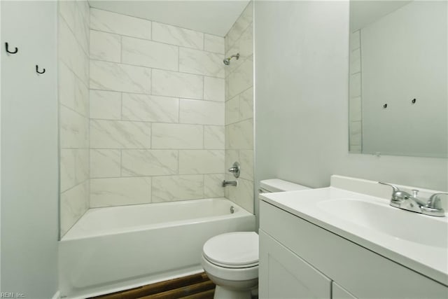 full bath with toilet, vanity, and shower / washtub combination