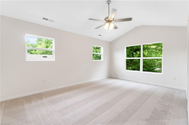 3127 Lens Ave, Norfolk, VA 23509 - spare room with light colored carpet, a ceiling fan, vaulted ceiling, and baseboards