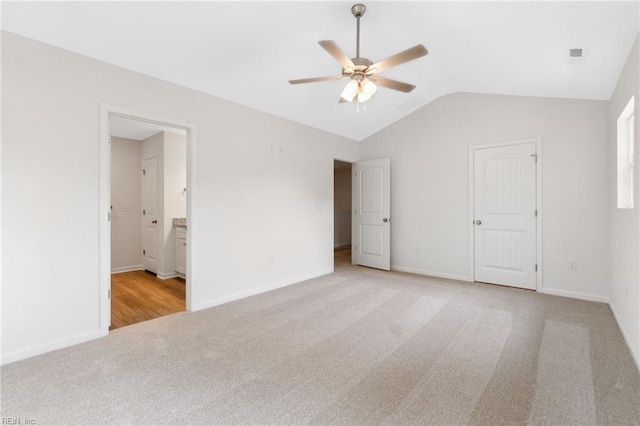 3127 Lens Ave, Norfolk, VA 23509 - unfurnished bedroom with light colored carpet, lofted ceiling, baseboards, ensuite bathroom, and ceiling fan