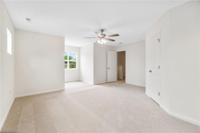 3127 Lens Ave, Norfolk, VA 23509 - empty room featuring light colored carpet, a ceiling fan, and baseboards