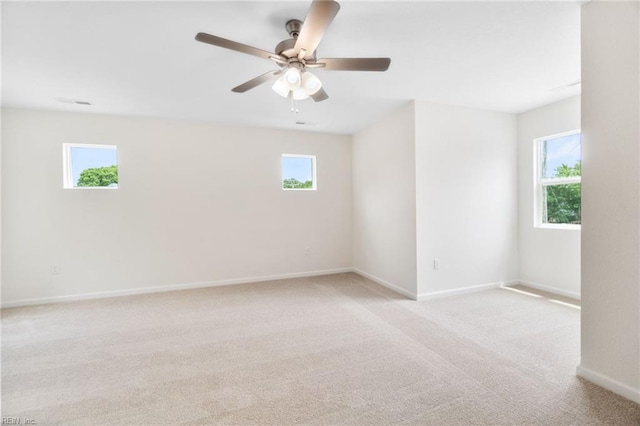 3127 Lens Ave, Norfolk, VA 23509 - spare room with healthy amount of natural light, light colored carpet, baseboards, and ceiling fan