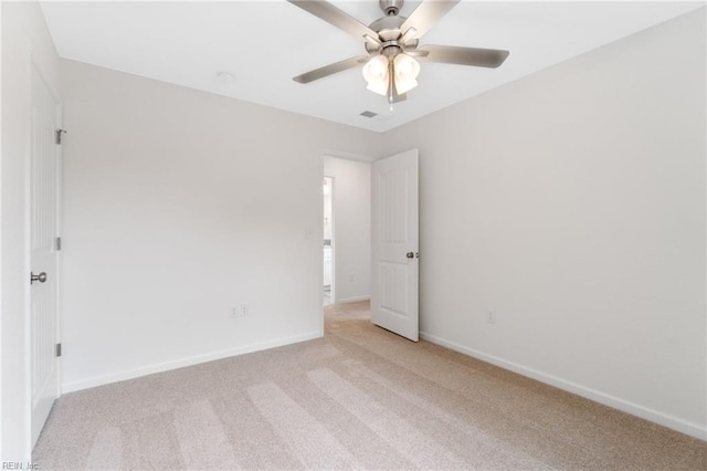 3127 Lens Ave, Norfolk, VA 23509 - unfurnished room featuring light colored carpet, a ceiling fan, and baseboards