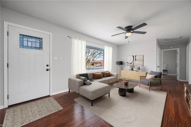 9 Prince George Dr, Hampton, VA 23669 - living area with dark wood-type flooring, baseboards, and a ceiling fan