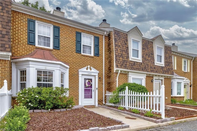1240 Mill Stream Way, Chesapeake, VA 23320 - multi unit property with brick siding, fence, a shingled roof, and a chimney