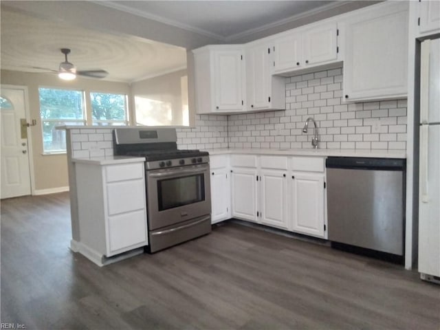 1914 Long Green Ln, Hampton, VA 23663 - kitchen with appliances with stainless steel finishes, crown molding, light countertops, white cabinets, and dark wood finished floors