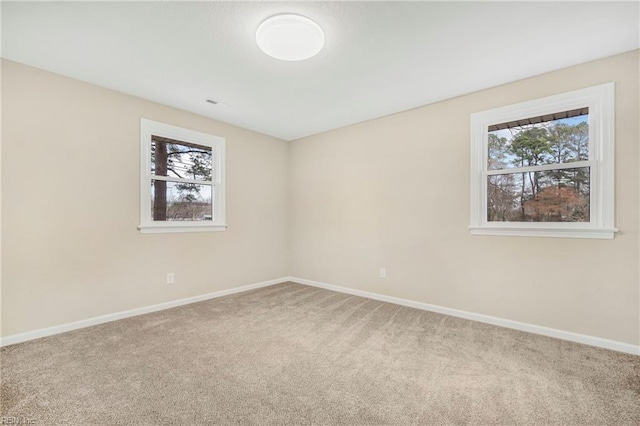 837 Mount Pleasant Rd, Chesapeake, VA 23322 - carpeted empty room with baseboards and plenty of natural light