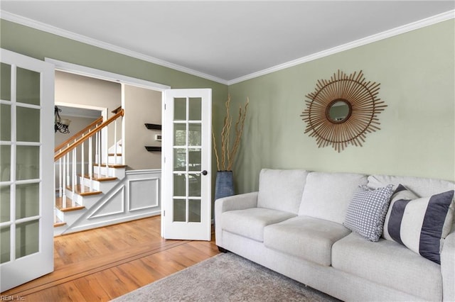 2124 Thackeray Ln, Virginia Beach, VA 23454 - living room with french doors, crown molding, wood finished floors, and stairs