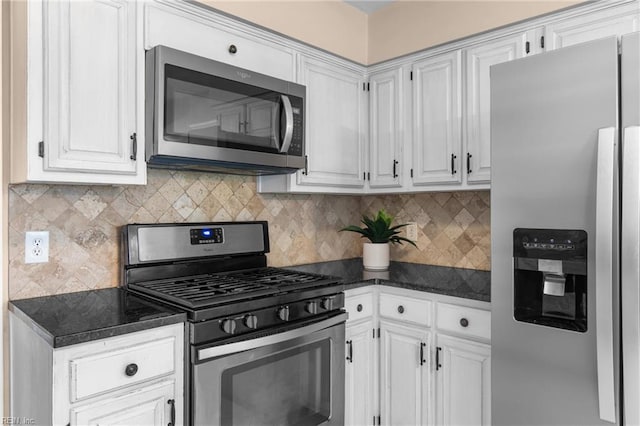 2124 Thackeray Ln, Virginia Beach, VA 23454 - kitchen featuring appliances with stainless steel finishes, dark countertops, decorative backsplash, and white cabinetry