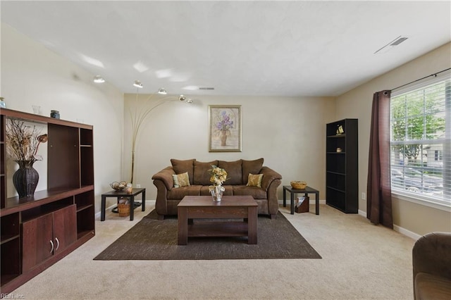 6701 Burbage Landing Cir, Suffolk, VA 23435 - living area with light colored carpet and baseboards