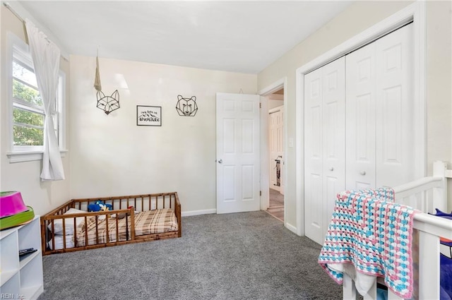 504 Amster Ln, Chesapeake, VA 23323 - bedroom featuring carpet, a closet, and baseboards