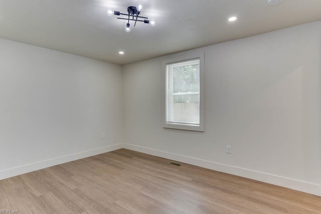 1413 Elm Ave, Portsmouth, VA 23704 - spare room with baseboards, light wood-type flooring, and recessed lighting