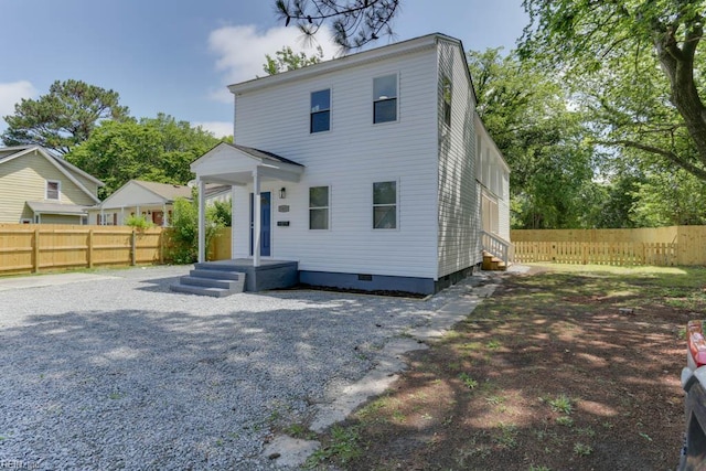 1413 Elm Ave, Portsmouth, VA 23704 - back of house with crawl space and fence