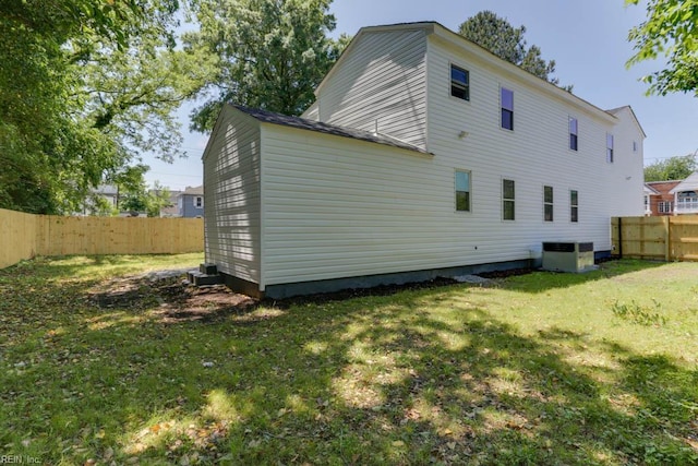 1413 Elm Ave, Portsmouth, VA 23704 - back of house featuring central AC unit