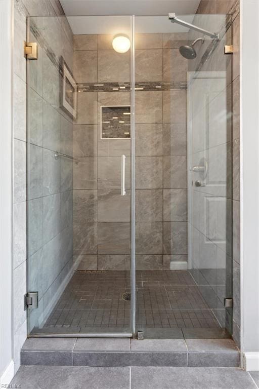 218 Woodburne Ln, Newport News, VA 23602 - full bathroom with a stall shower and baseboards