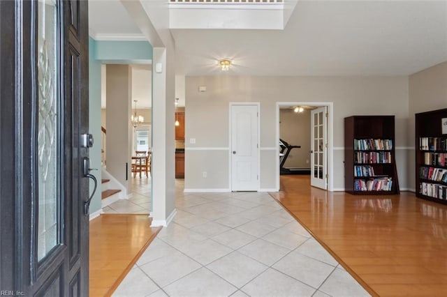 218 Woodburne Ln, Newport News, VA 23602 - entryway featuring light tile patterned flooring, stairs, french doors, a chandelier, and baseboards