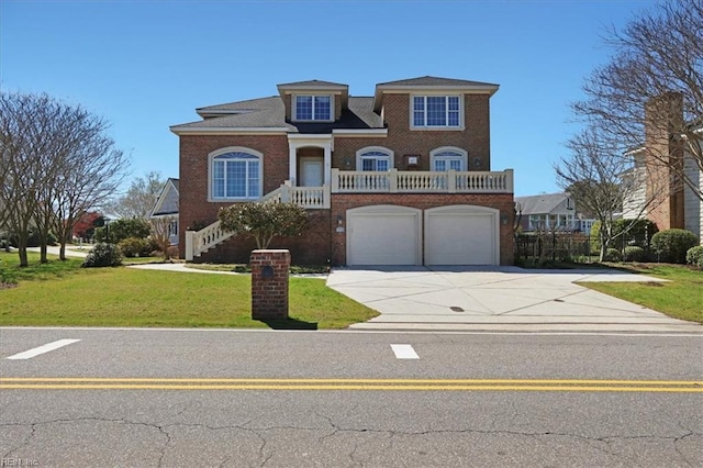 433 Croatan Rd, Virginia Beach, VA 23451 - colonial home featuring driveway, a front lawn, brick siding, a garage, and a balcony