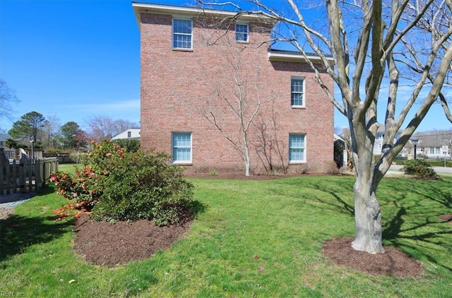 433 Croatan Rd, Virginia Beach, VA 23451 - view of side of property with brick siding and a lawn