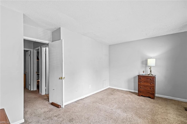 2156 Kimball Cir, Virginia Beach, VA 23455 - unfurnished bedroom featuring carpet flooring, a textured ceiling, and baseboards