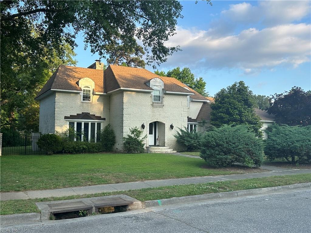 2537 Lakewood Ln, Chesapeake, VA 23321 - french provincial home featuring brick siding and a chimney