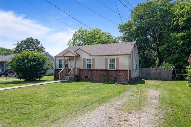 16 Warner Rd, Hampton, VA 23666 - view of front of house featuring brick siding, driveway, and crawl space