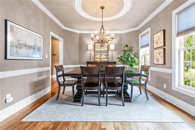 1704 Lower Church Ct, Virginia Beach, VA 23455 - dining area with wood finished floors, a chandelier, baseboards, and ornamental molding