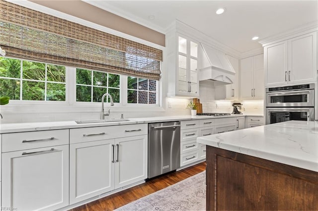 1704 Lower Church Ct, Virginia Beach, VA 23455 - kitchen with appliances with stainless steel finishes, a sink, healthy amount of natural light, white cabinets, and crown molding