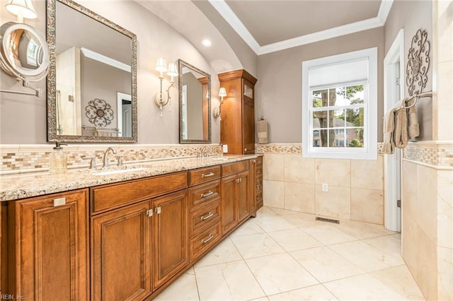 1704 Lower Church Ct, Virginia Beach, VA 23455 - bathroom featuring tile walls, double vanity, crown molding, wainscoting, and tile patterned flooring