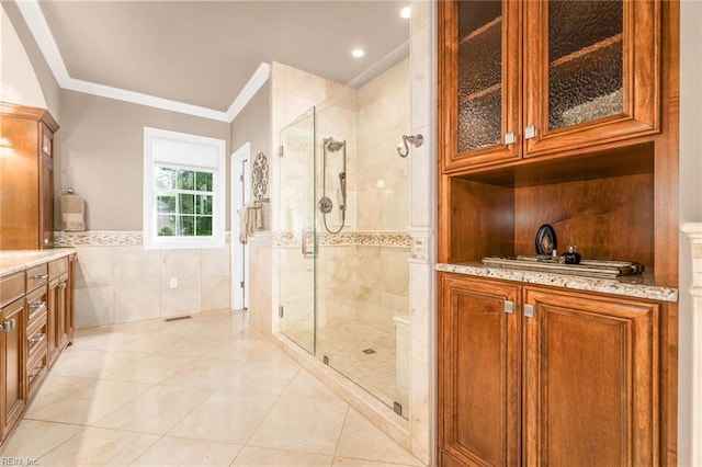 1704 Lower Church Ct, Virginia Beach, VA 23455 - full bathroom with tile walls, vanity, a stall shower, crown molding, and a wainscoted wall