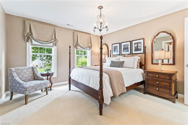 1704 Lower Church Ct, Virginia Beach, VA 23455 - bedroom featuring baseboards, light colored carpet, and a chandelier