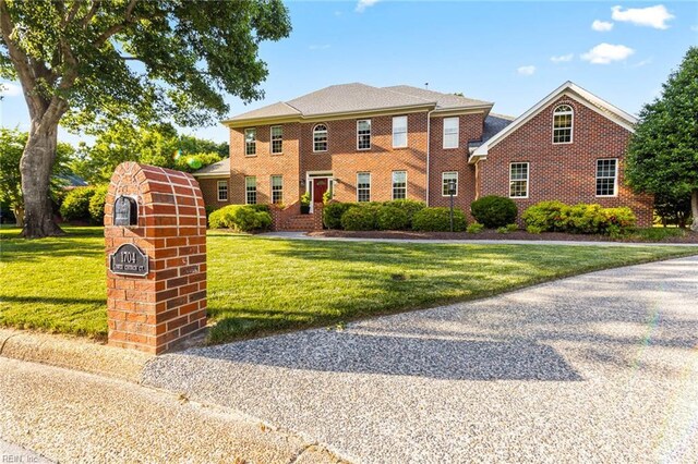 1704 Lower Church Ct, Virginia Beach, VA 23455 - colonial home with a front lawn and brick siding