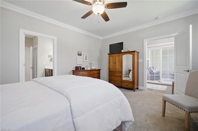 bedroom featuring ornamental molding, light carpet, a ceiling fan, and ensuite bath