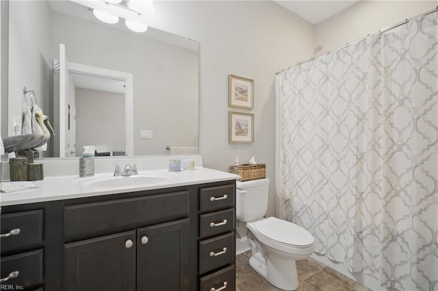 full bath featuring vanity, toilet, and curtained shower