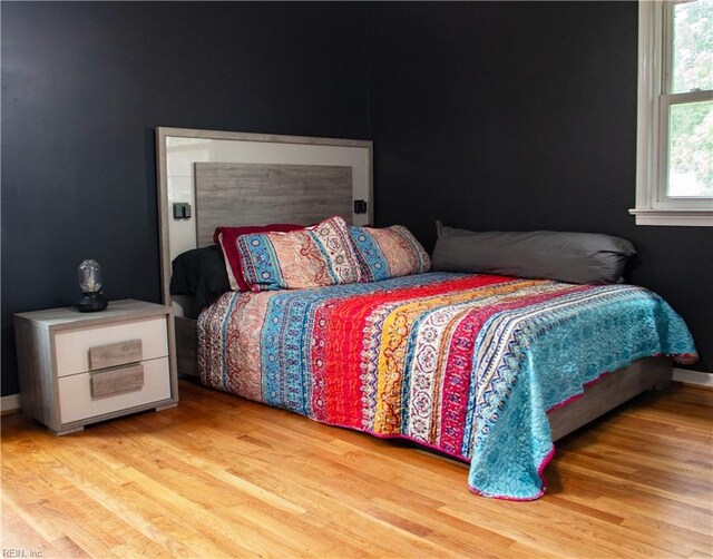 830 Burton St, Hampton, VA 23666 - bedroom featuring wood finished floors and baseboards