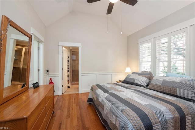 9517 24th Bay St, Norfolk, VA 23518 - bedroom featuring wood finished floors, wainscoting, lofted ceiling, a decorative wall, and a ceiling fan