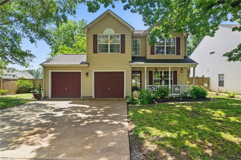 802 Shields Rd, Newport News, VA 23608 - traditional-style house featuring a porch, concrete driveway, and a shingled roof