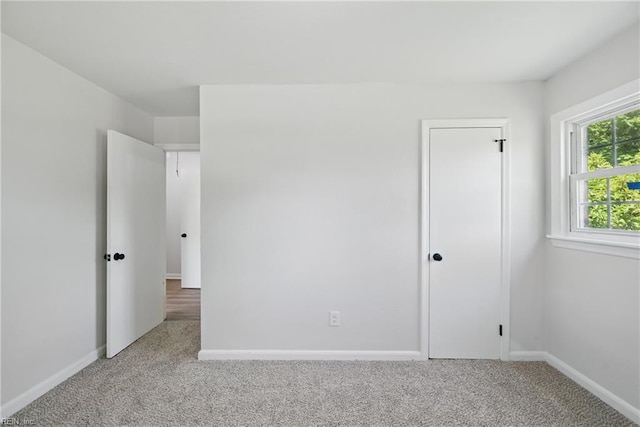 12 Carriage Ln, Newport News, VA 23606 - unfurnished bedroom with carpet floors and baseboards
