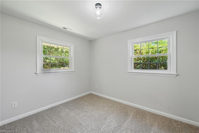 12 Carriage Ln, Newport News, VA 23606 - spare room featuring carpet flooring and baseboards