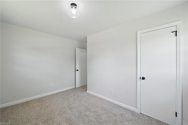 12 Carriage Ln, Newport News, VA 23606 - unfurnished bedroom featuring carpet flooring and baseboards