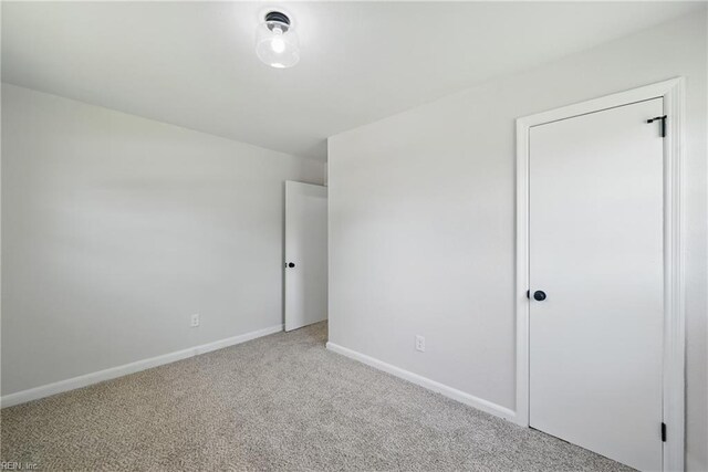 12 Carriage Ln, Newport News, VA 23606 - unfurnished bedroom with carpet floors and baseboards